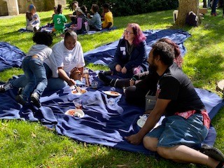 people eating at picnic